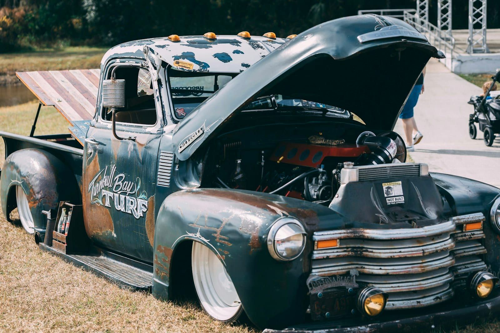 Pickup engine bay — compressor mount adds to labor cost