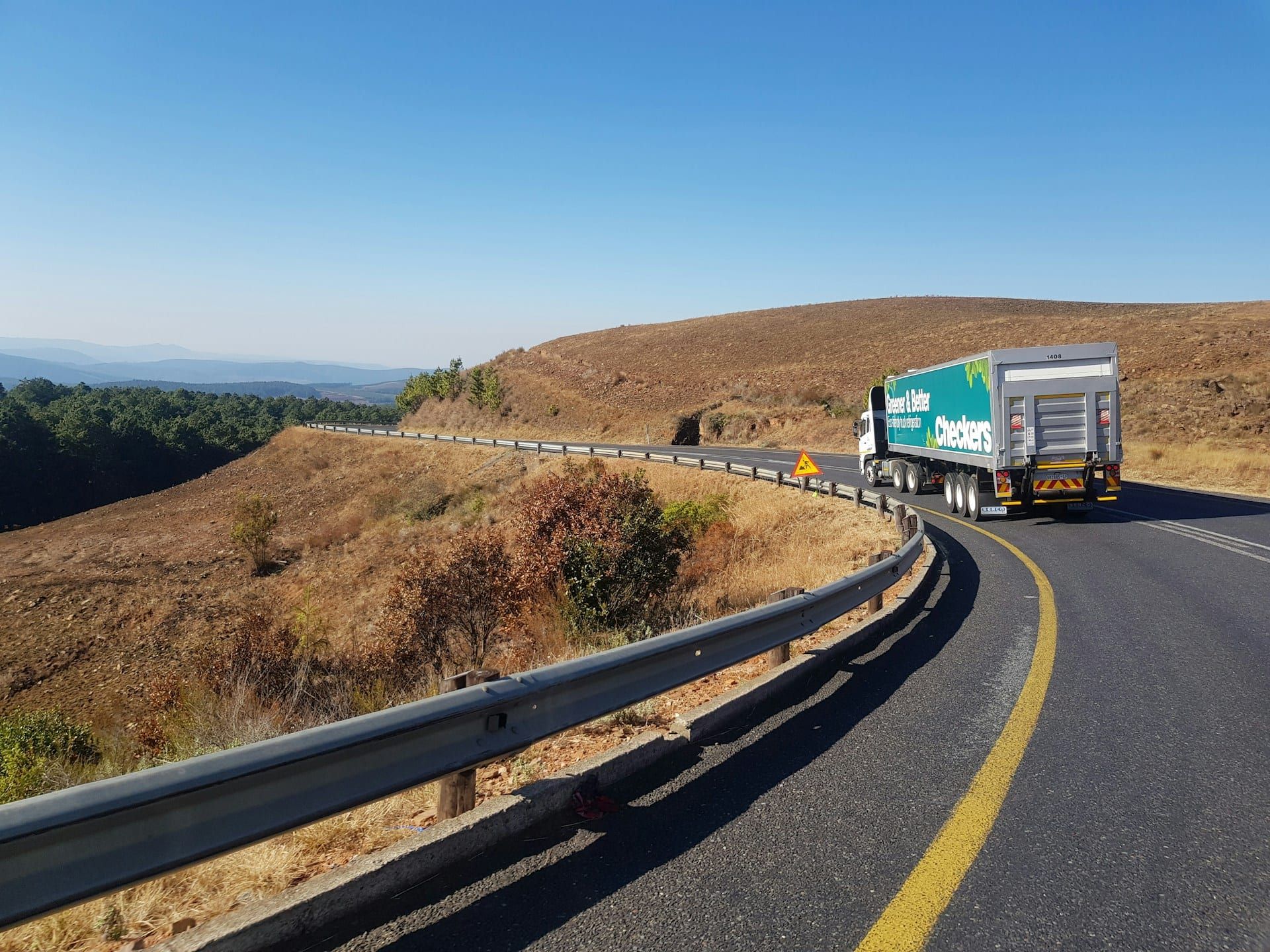 Commercial truck on road daytime — retail buyer perspective